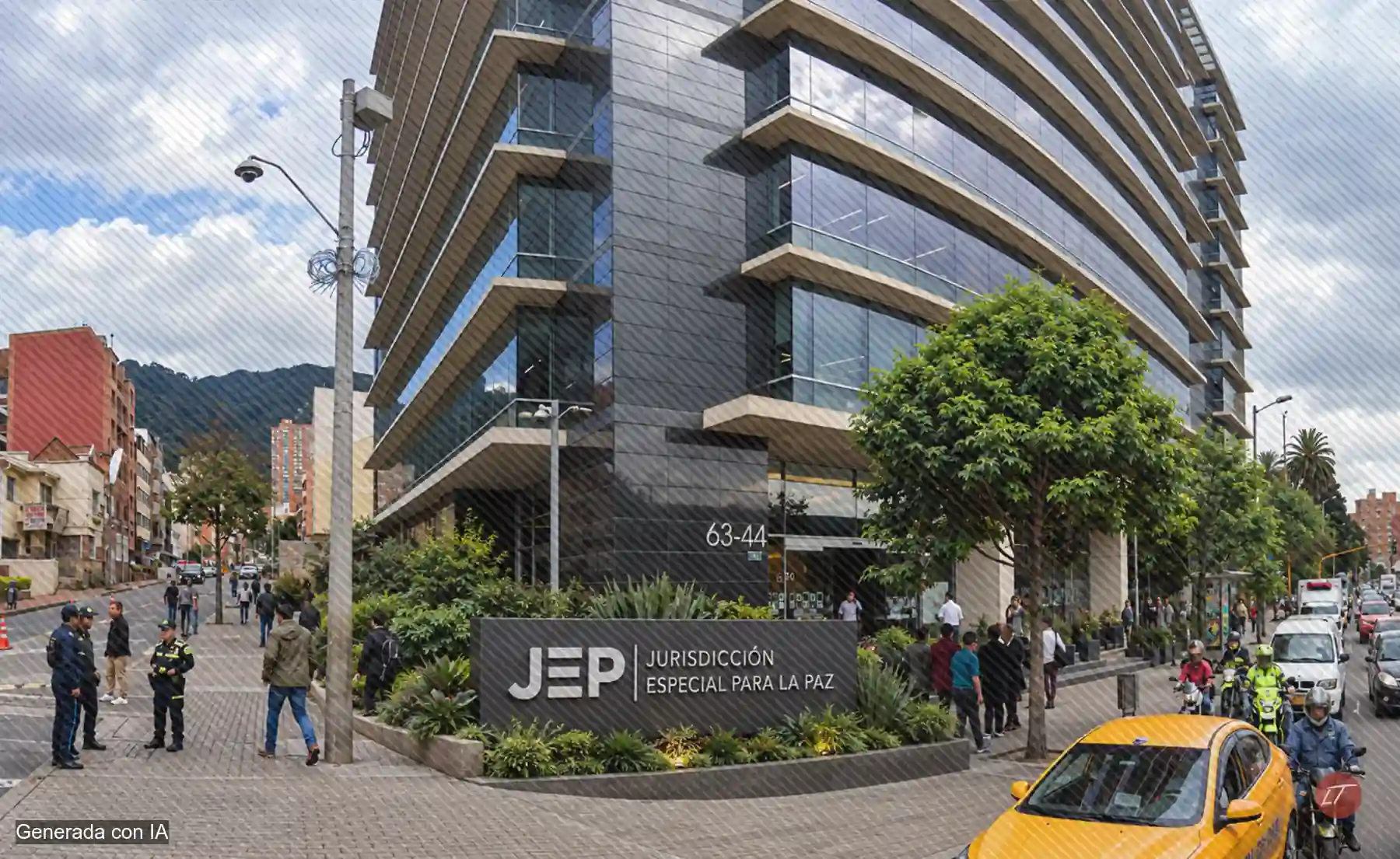 Edificio con letrero de la Jurisdicción Especial para la Paz junto a una calle